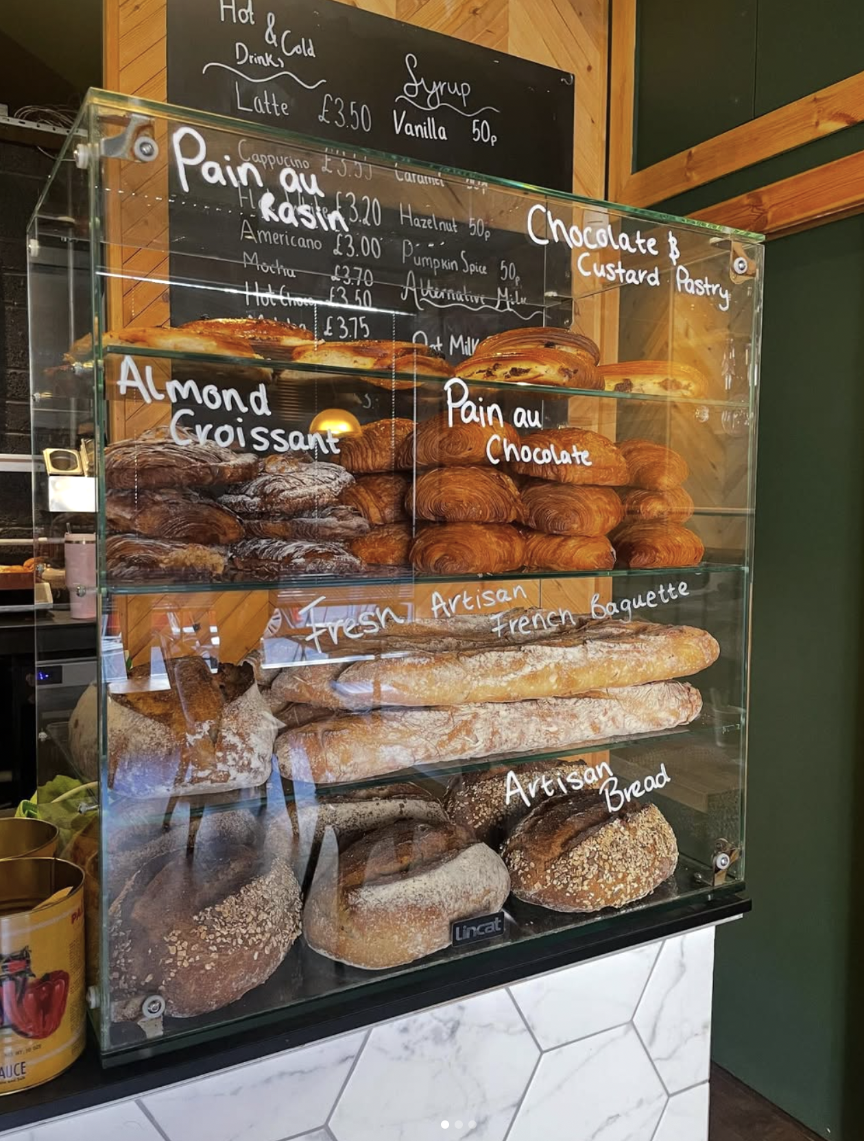 Fresh pastry case at Blues Cafe, Salamander Street, Leith — croissants and French pastries baked daily